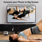 Phone connected to a TV through the adapter, mirroring to the big screen