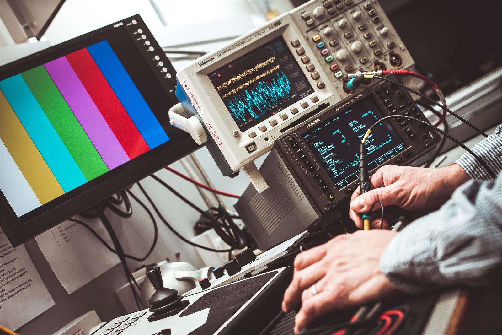 Electronic equipment being tested with measurement instruments